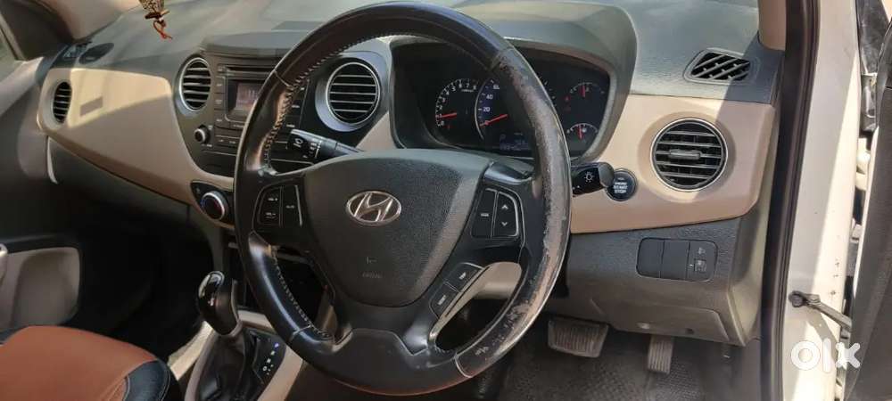 White Hyundai Xcent 2015 Petrol. Automatic Transmission.good Condition