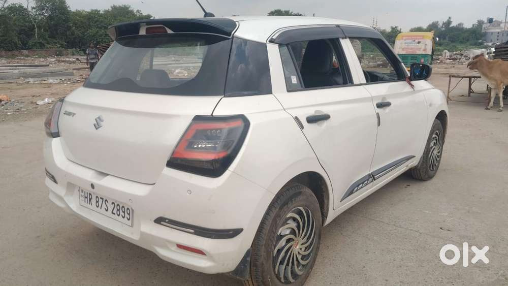 Maruti Suzuki Swift 1.2 Lxi (o), 2024, Petrol