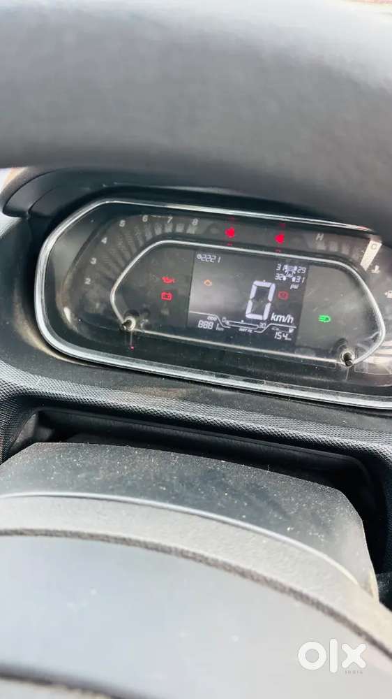 This Is The Top Model Tata Tiago  It's A New Car Driveen Only 9000 Km