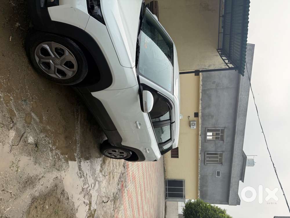 Maruti Suzuki Brezza Vxi At 2025