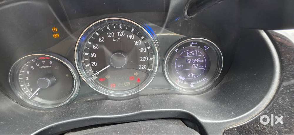 Honda New City V (petrol + Cng) Golden Brown