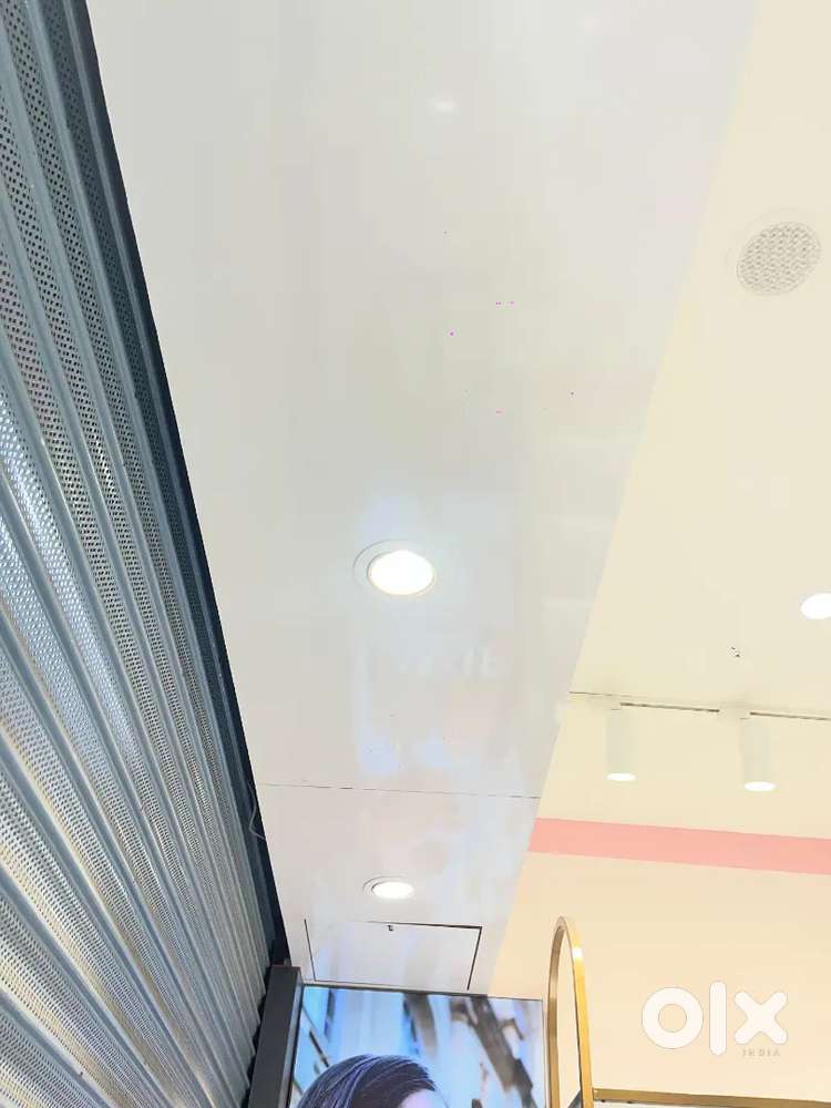 Industrial-Style Interior Ceiling with Black Track Lights