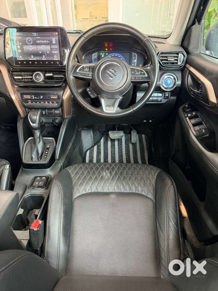 Maruti Suzuki Grand Vitara 1.5 Zeta Plus Dual Tone Intelligent Hybri..