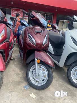 Scooty price below discount 10000