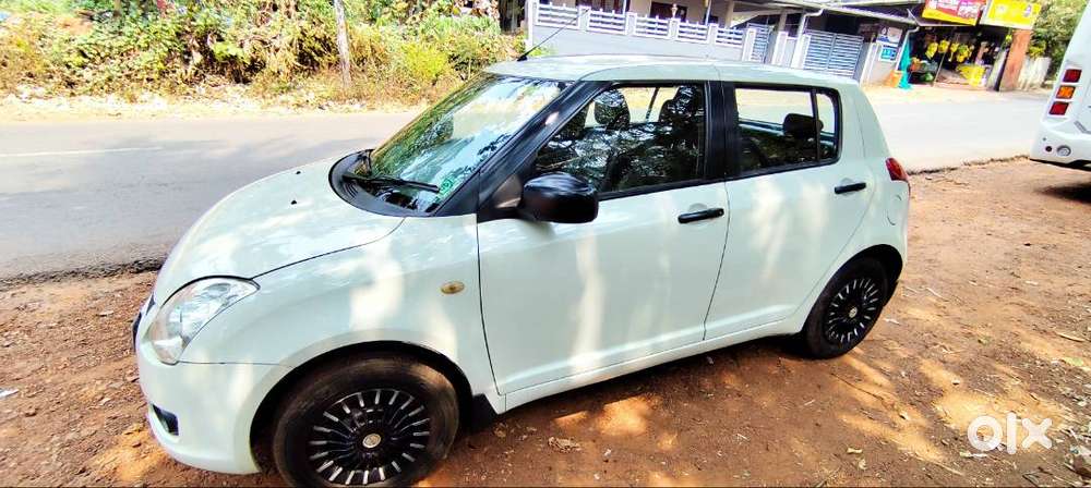 Swift Vxi White Colour