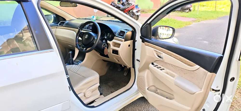 Well-maintained Ciaz Delta Hybrid White 35k Kms Alloy Wheels