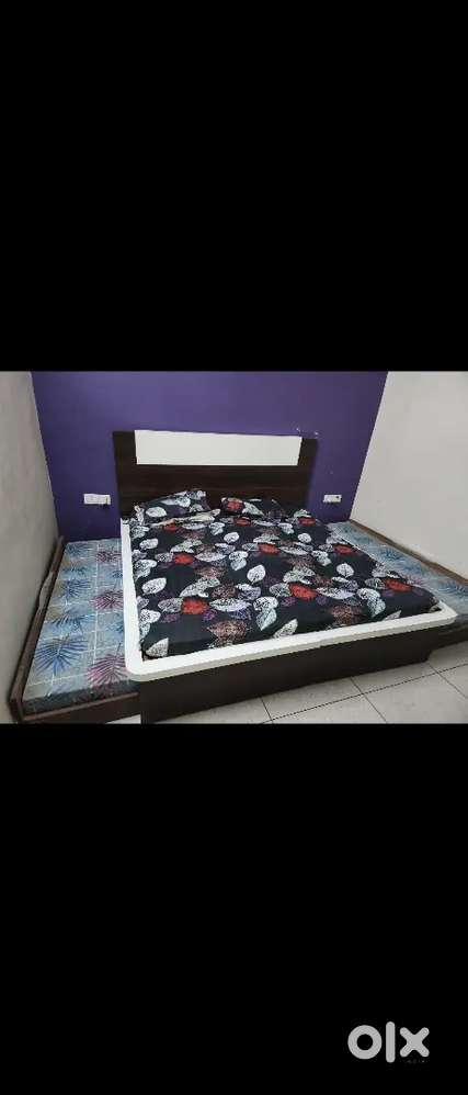 Double bed with 2 sliding bed