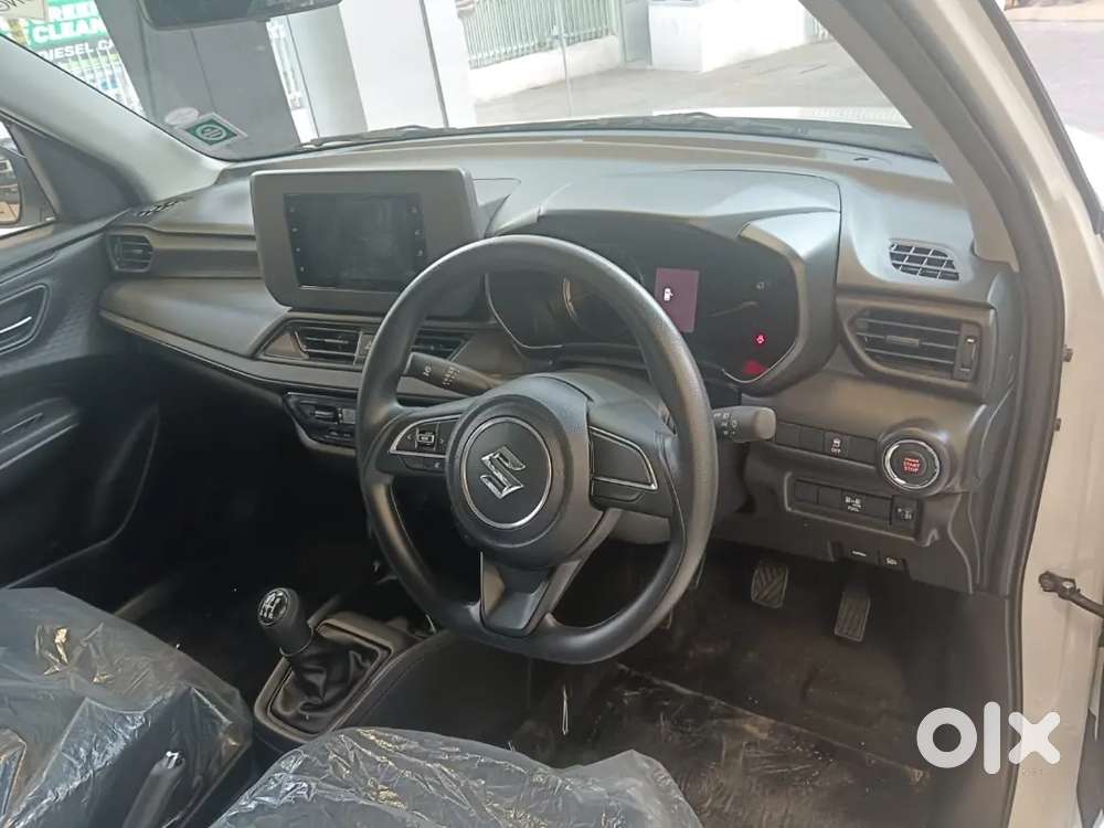 Maruti Suzuki Swift Vxi 2026