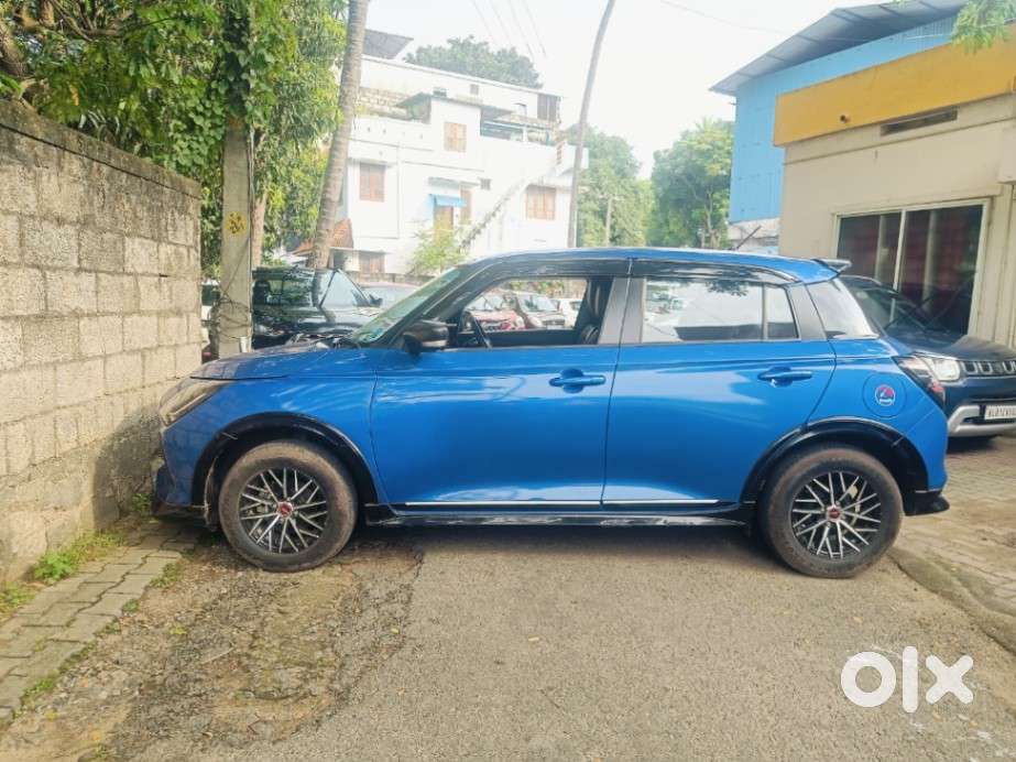 Maruti Suzuki Swift 1.2 Vxi (o), 2024, Petrol