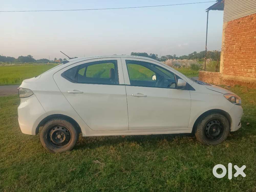 Tata Tigor Petrol 2017  .  7 Seater Car Lena H