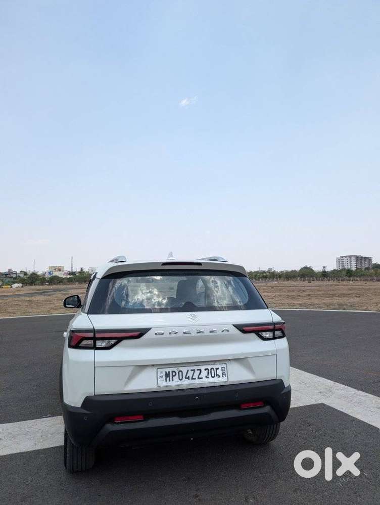 Maruti Suzuki Brezza 1.5 Lxi Smart Hybrid, 2024, Petrol
