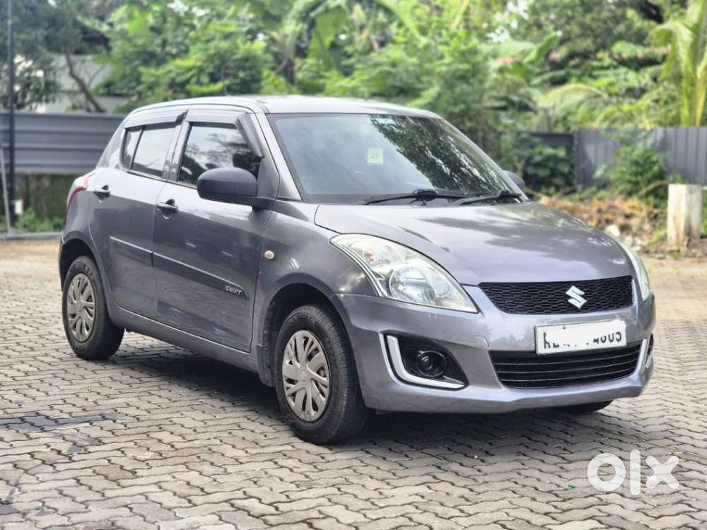 Maruti Suzuki Swift Lxi Optional-o, 2015, Petrol