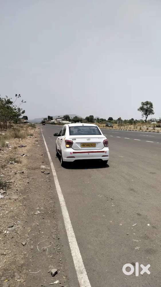 Xcent Petrol Cng