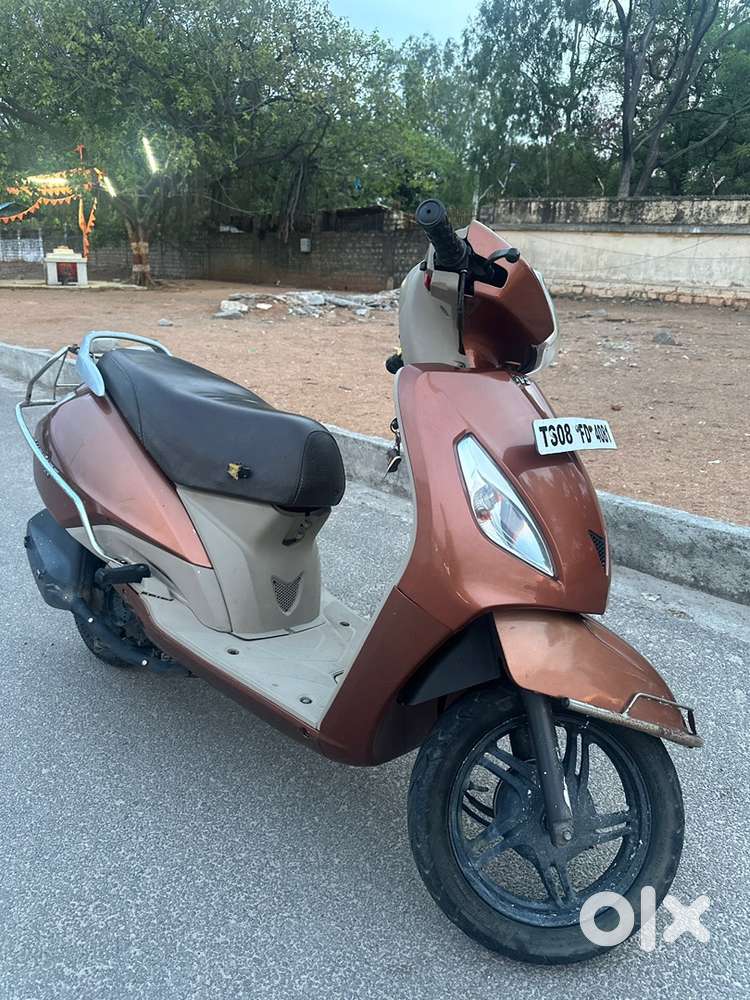 TVS Jupiter ZX Very less driven Super Neat Condition Brown Color
