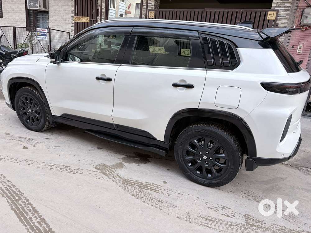 Maruti Suzuki Grand Vitara 1.5 Alpha Plus Dual Tone Intelligent Hybr..