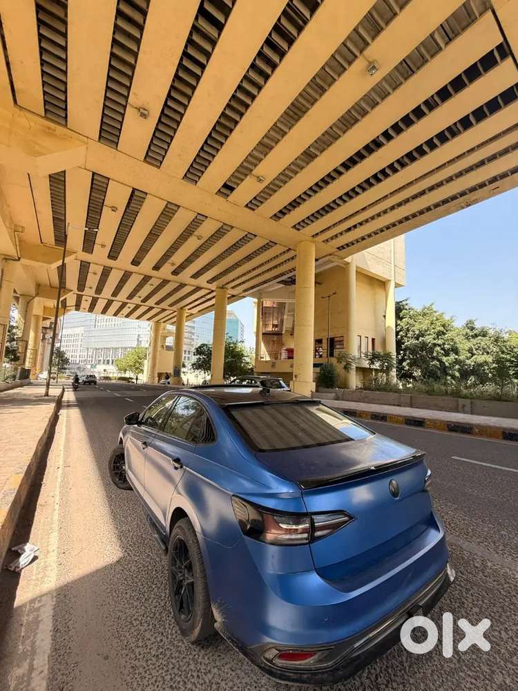 Virtus 1.0 Tsi Rising Blue Colour Wrapped In Matte Ppf