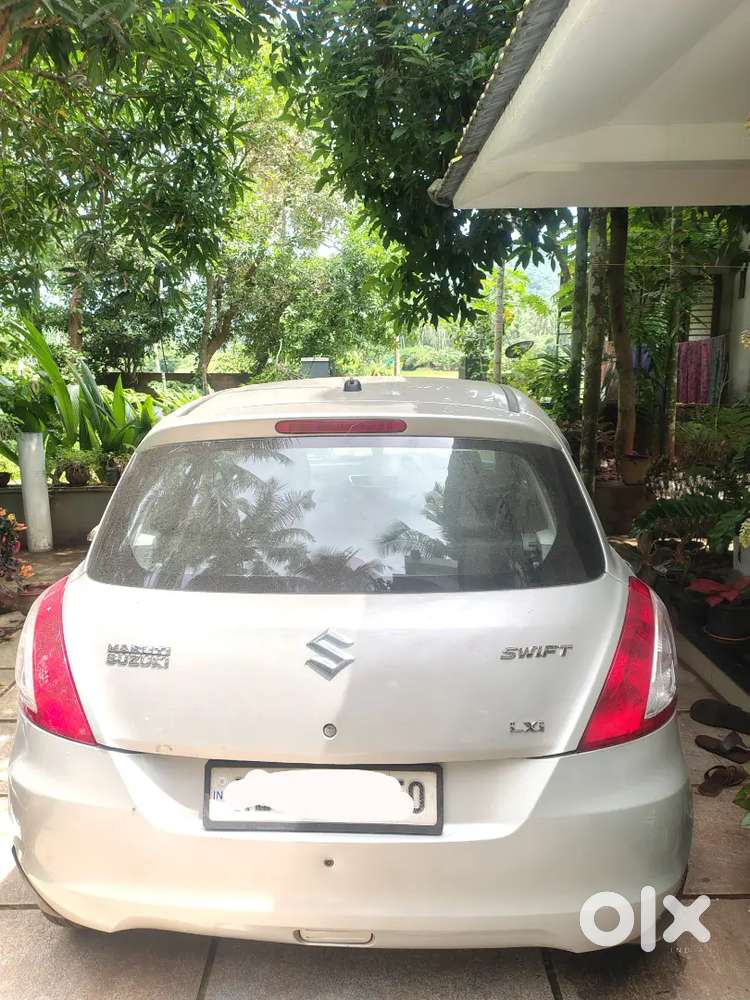 Maruti Suzuki Swift Lxi 2016