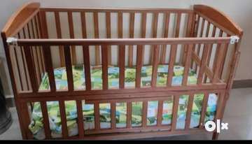 Baby wooden cradle olx hotsell