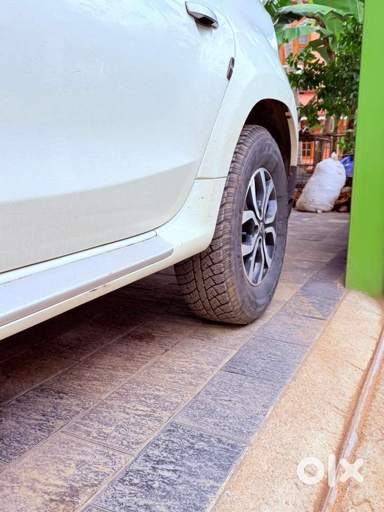 Nissan Petrol Car 2014