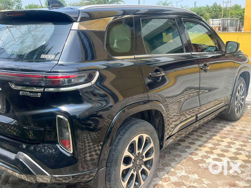 Maruti Suzuki Grand Vitara 1.5 Zeta Plus Dual Tone Intelligent Hybri..