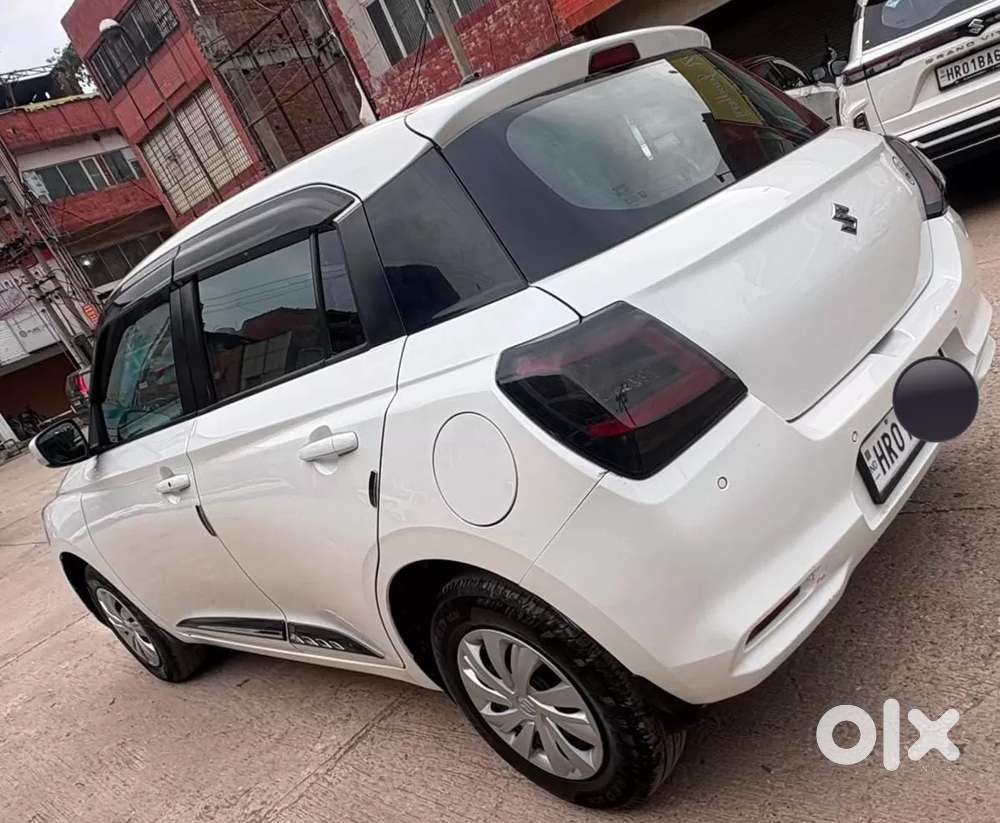 Maruti Suzuki Swift 1.2 Vxi (o), 2024, Petrol