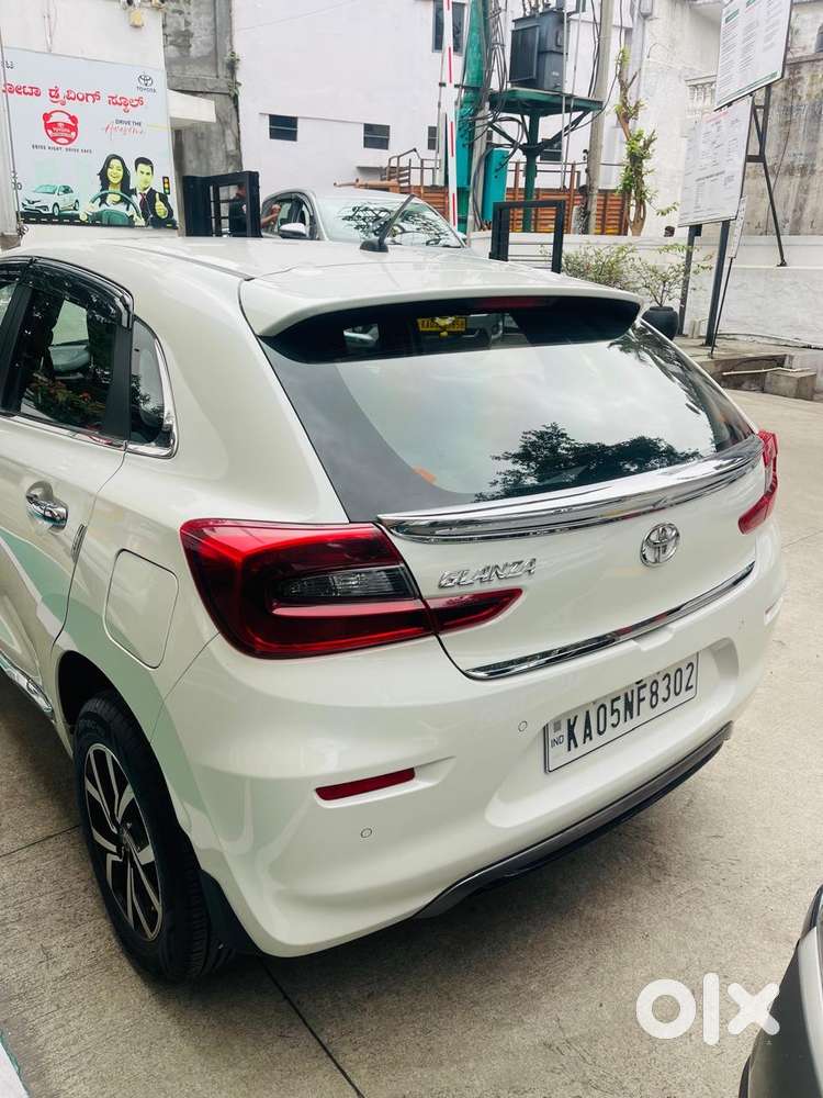 Toyota Glanza Cream White, Brand New Condition, Used Very Less.