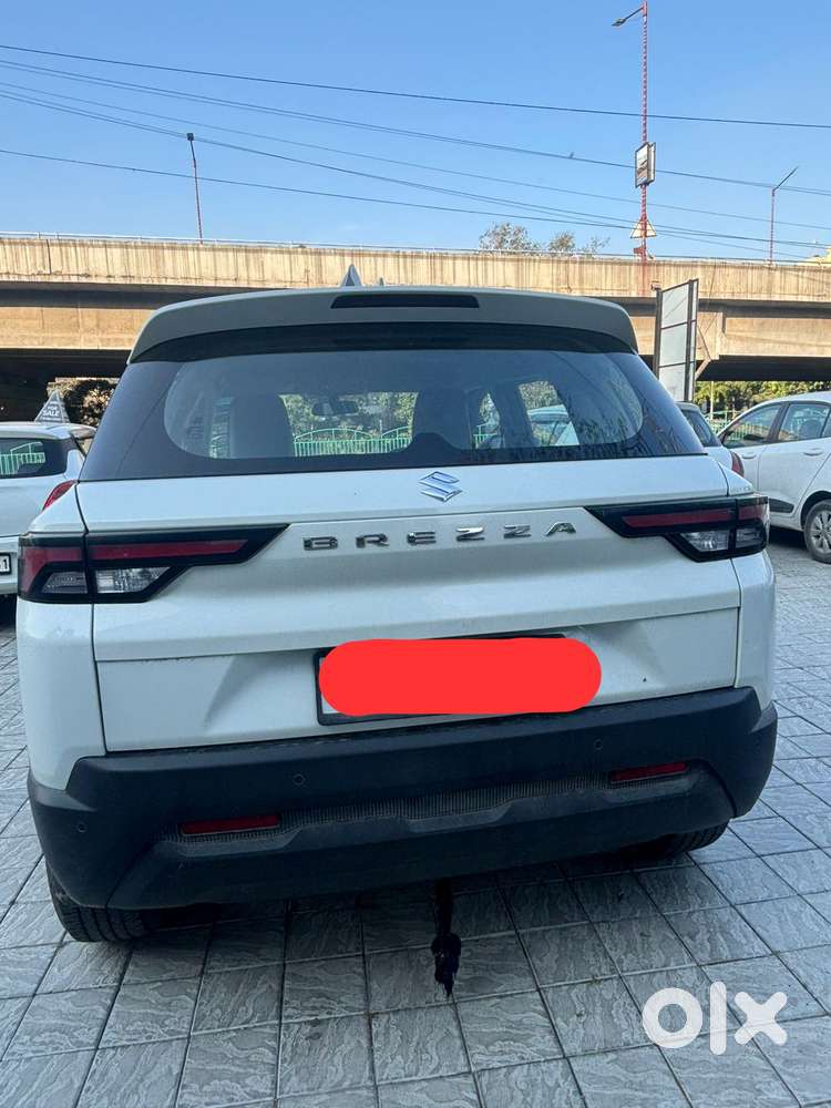 Maruti Suzuki Brezza 1.5 Lxi Smart Hybrid, 2024, Petrol