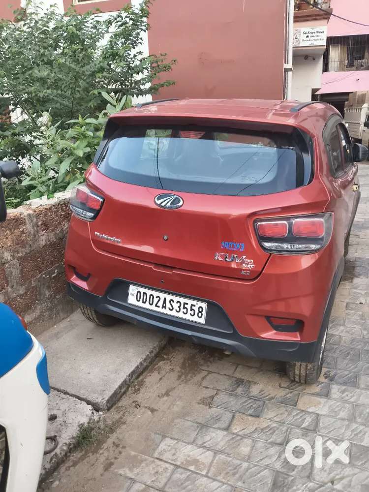 Well-maintained 2018 Mahindra Kuv100 K2 (red)