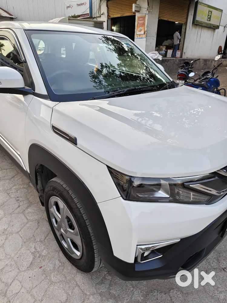 2025 Maruti Suzuki Brezza Lxi Petrol  5,000 Km  1st Owner