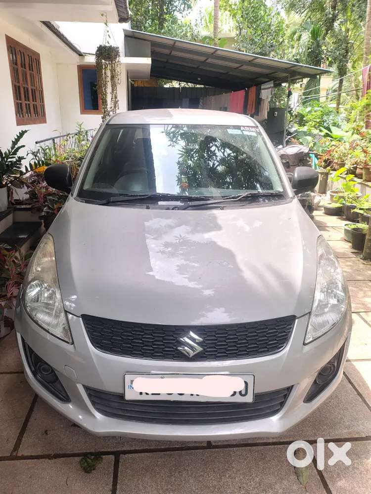 Maruti Suzuki Swift Lxi 2016