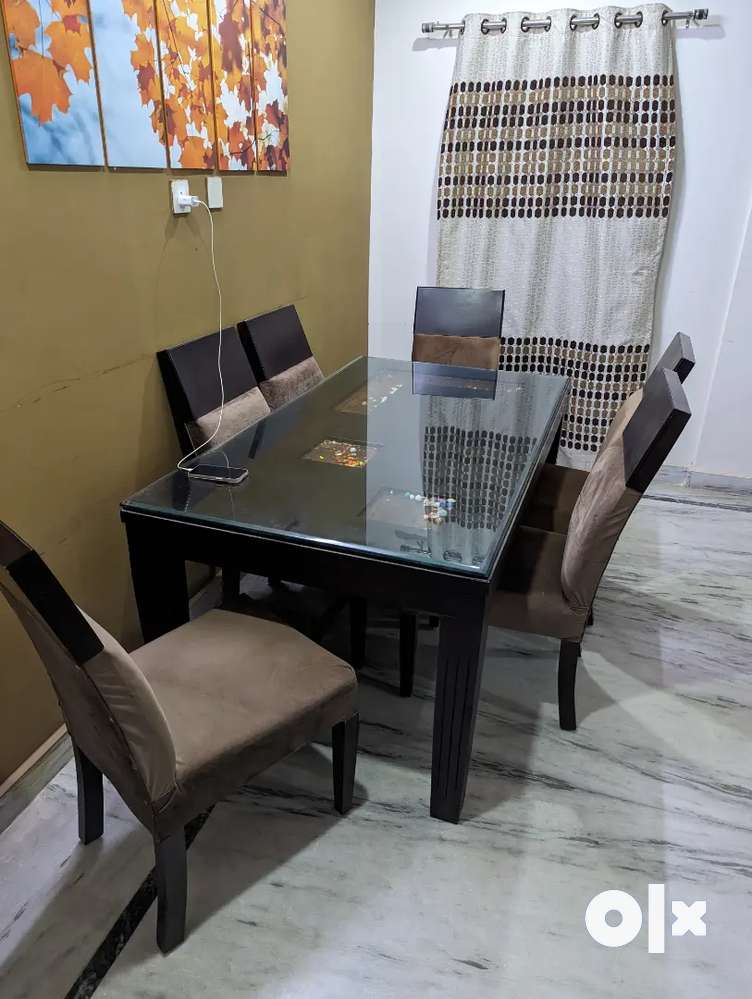 Dining table chairs olx hot sale