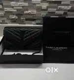 The Yves Saint Laurent Black On Black Leather Crossbody Bag