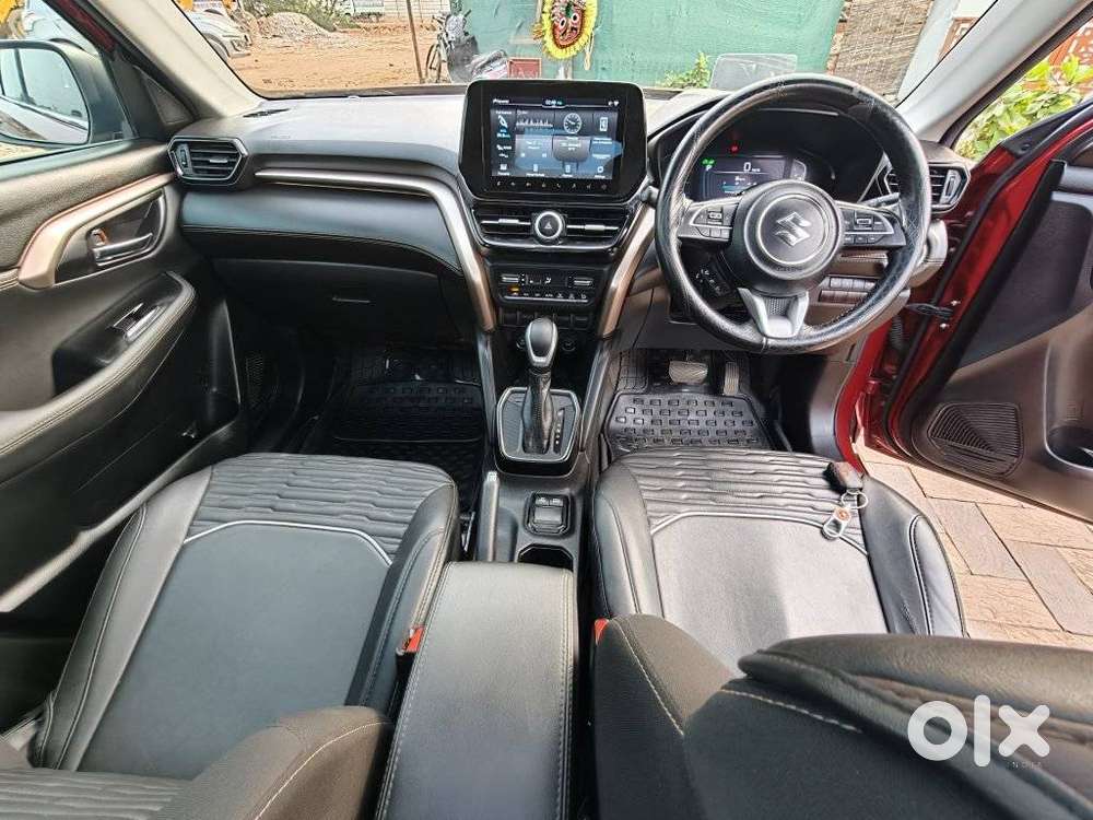 Maruti Suzuki Grand Vitara 1.5 Zeta Plus Dual Tone Intelligent Hybri..