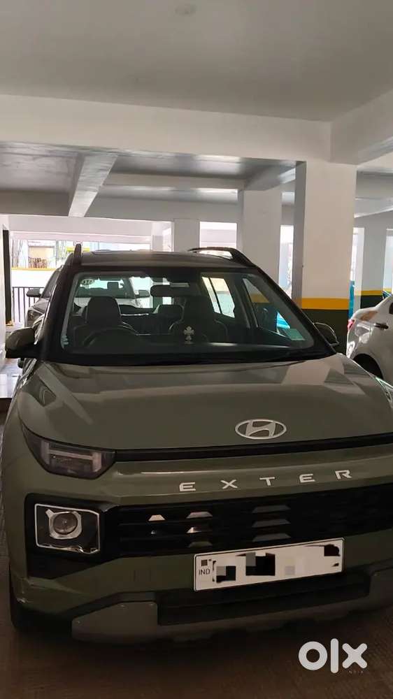 Doctor-driven 2023 Hyundai Exter Automatic  Top Variant  Ranger Khak