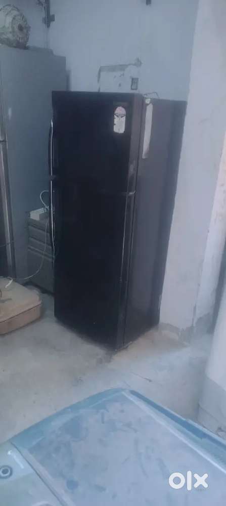 Samsung company black colour double door fridge proper working conditi