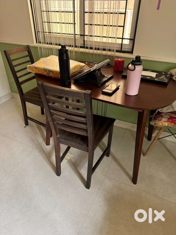 Two seater wooden dining table