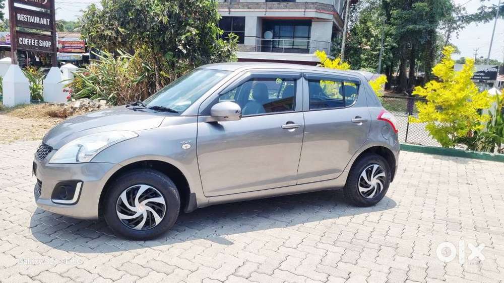 Maruti Suzuki Swift Lxi Optional-o, 2017, Petrol