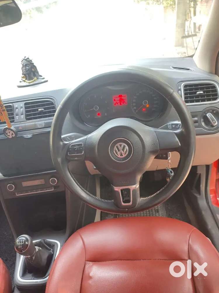 It's A Red Colour Polo With 17 Inchi Alloys