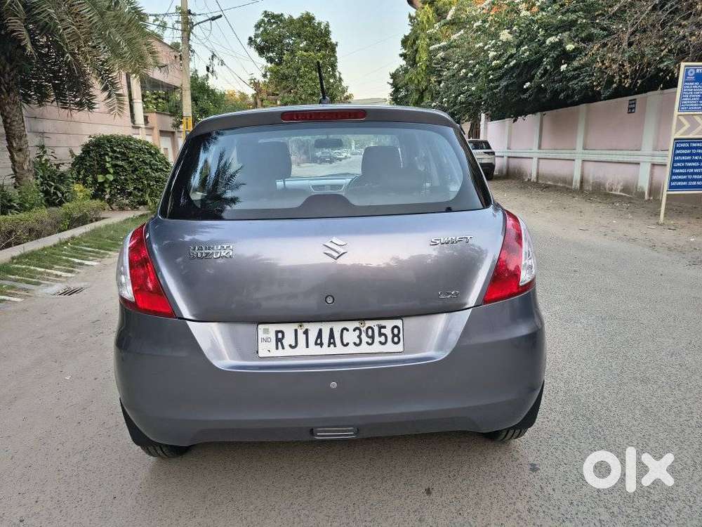 Maruti Suzuki Swift Lxi Optional-o, 2015, Petrol