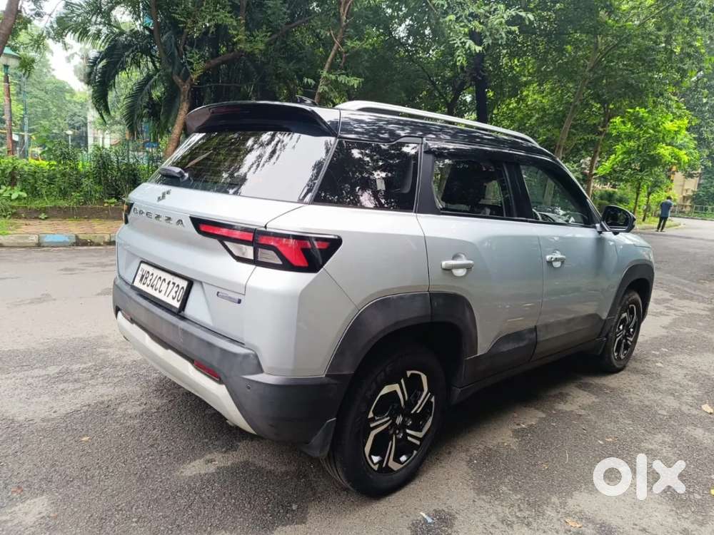 Maruti Suzuki Brezza 1.5 Zxi Plus Smart Hybrid Dual Tone, 2023, Petr..