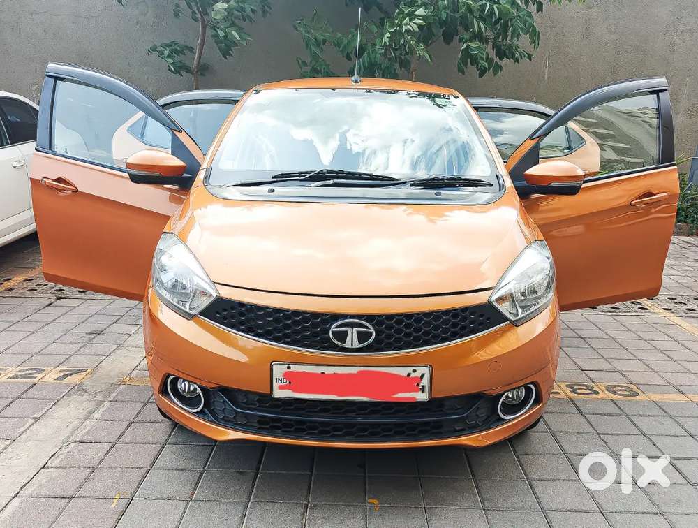 Tata Tiago 2018 Xza In Sunburst Orange With First Party Insurance