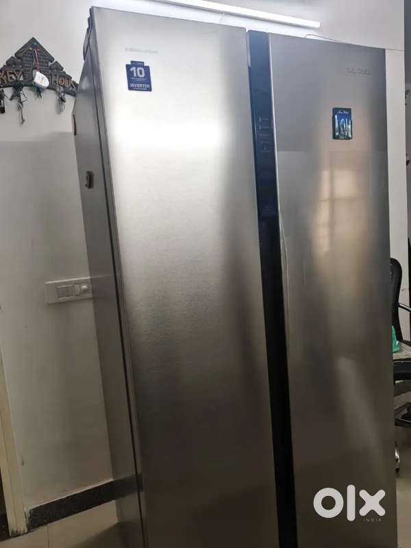 Side by side 1 year old jumbo refrigerator hardly used