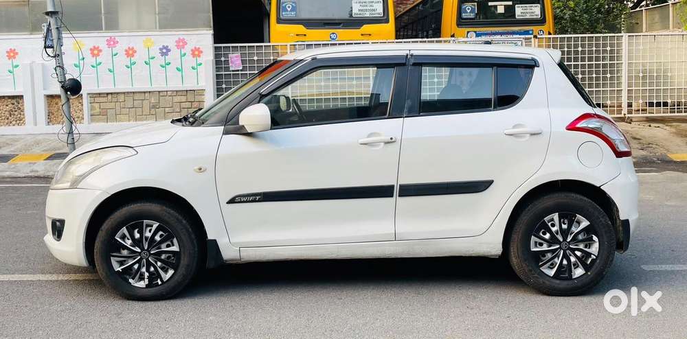 Maruti Suzuki Swift 1.2 Vxi (o), 2012, Petrol
