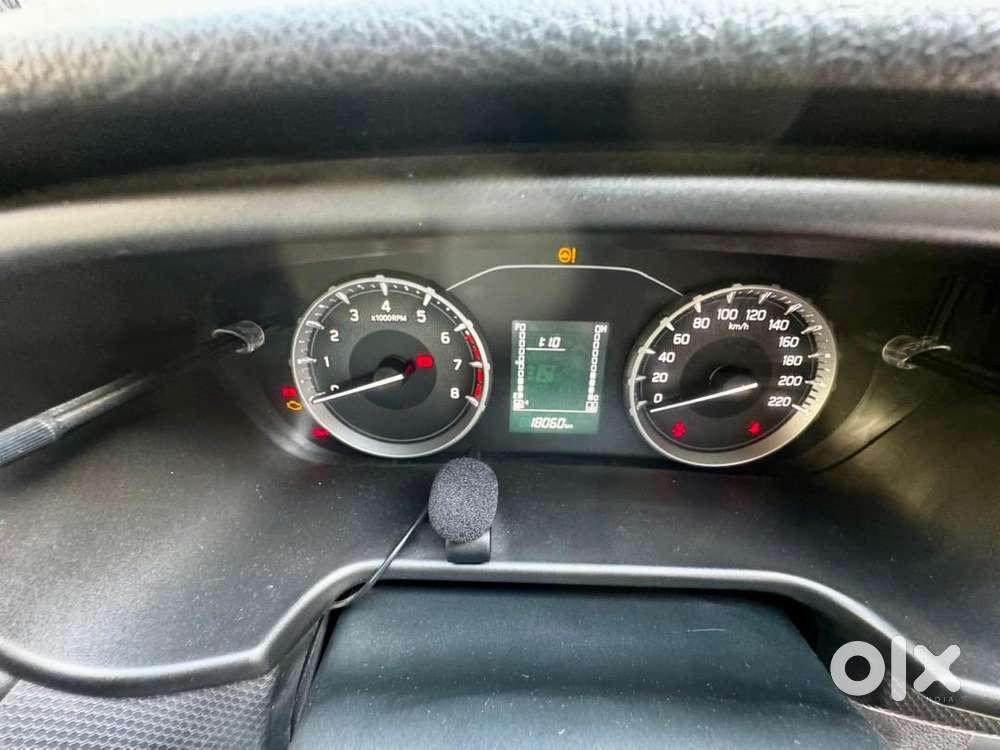  2024 Maruti Suzuki Brezza Lxi 1.5 Petrol Mt