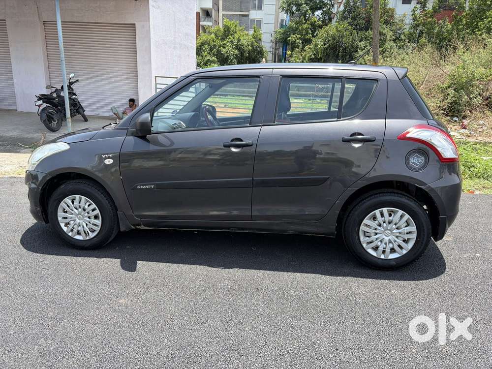 Maruti Suzuki Swift Lxi Optional-o, 2015, Petrol
