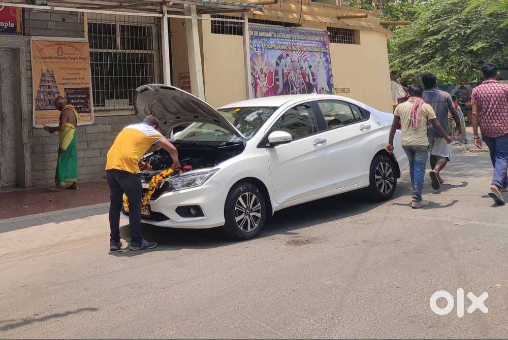 White Honda City Regd. On 11.01.2019