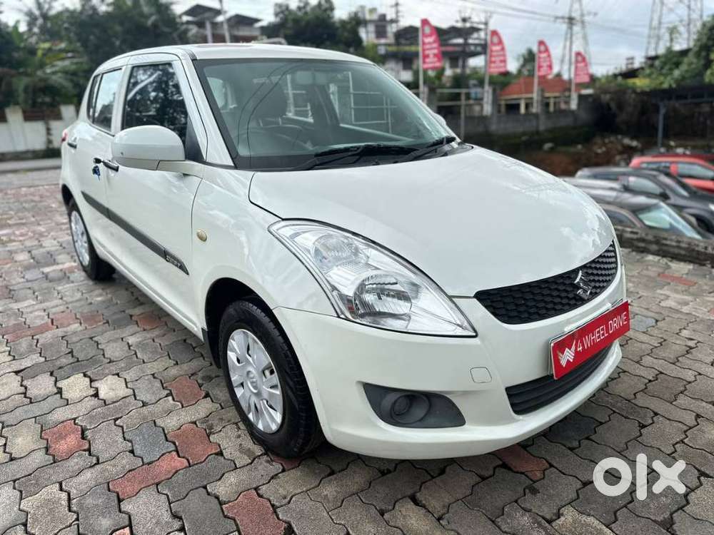 Maruti Suzuki Swift Lxi Optional-o, 2013