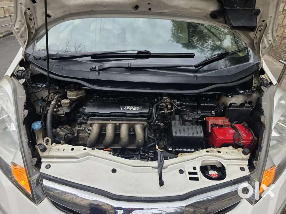 Doctor Using Well Maintained Honda Jazz