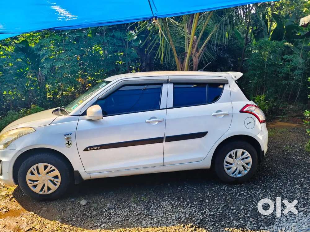 Maruti Suzuki Swift Lxi 2015
