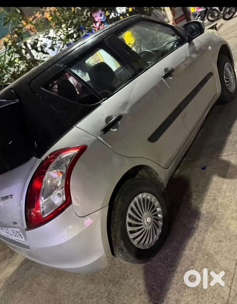 Maruti Suzuki Swift Lxi 2013